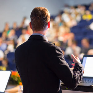 Speaker at Business Conference and Presentation.